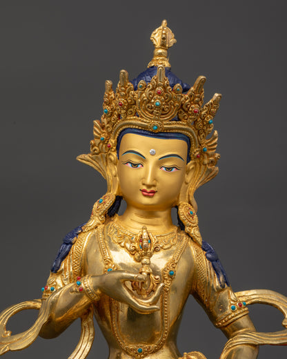 Regular close up Vajrasattva statue showing intricate robes and semi-precious stones
