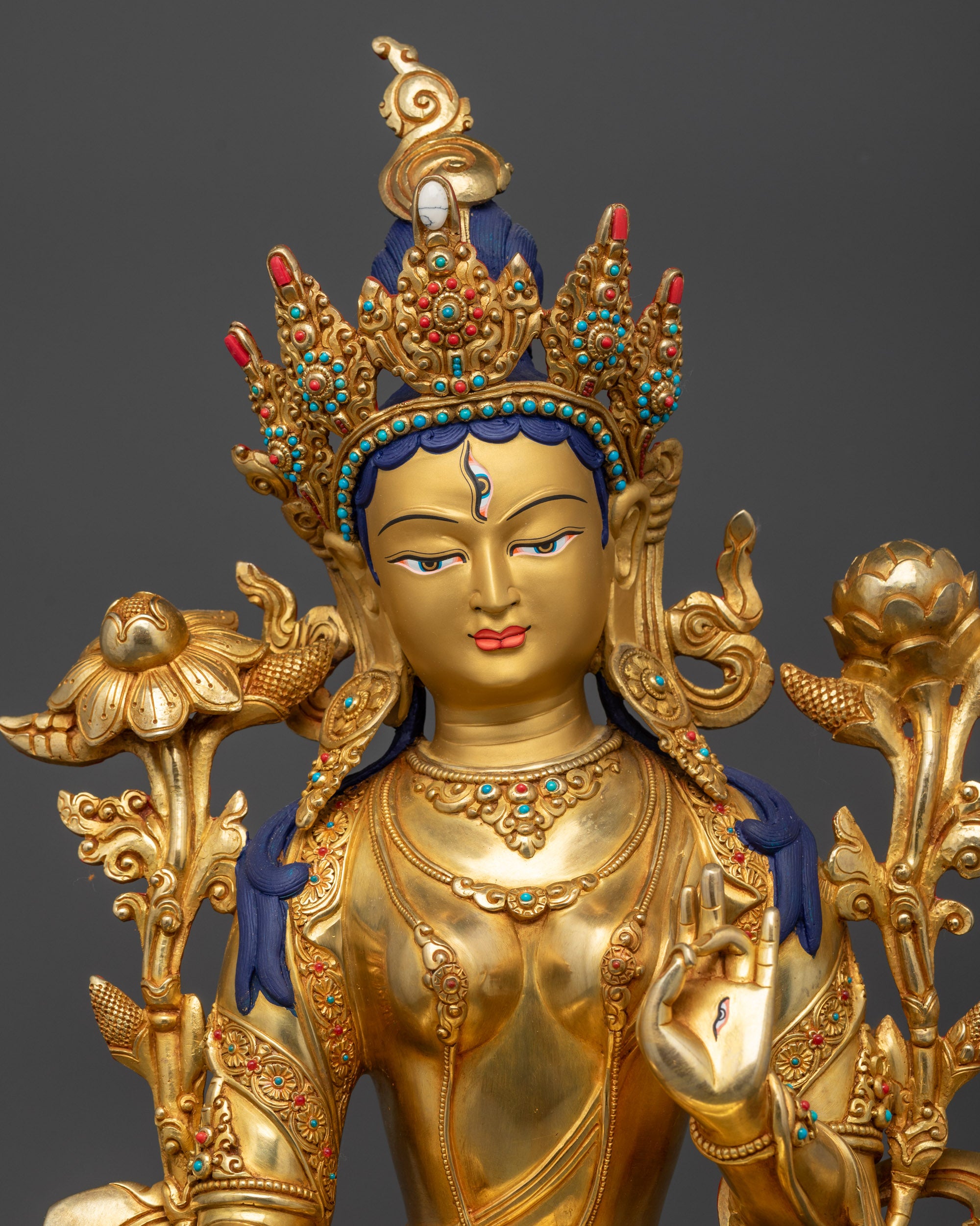 Regular close up White Tara holding utpala flower with Varada and Vitarka mudra