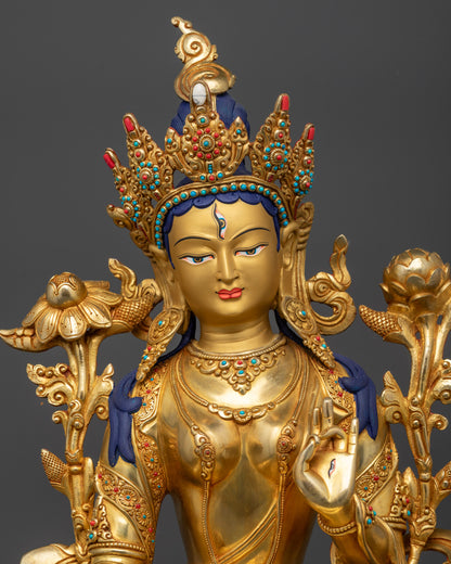 Regular close up White Tara holding utpala flower with Varada and Vitarka mudra
