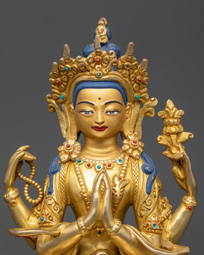 Regular close up of Chenrezig Statue showing semi-precious stone crown and jewelry
