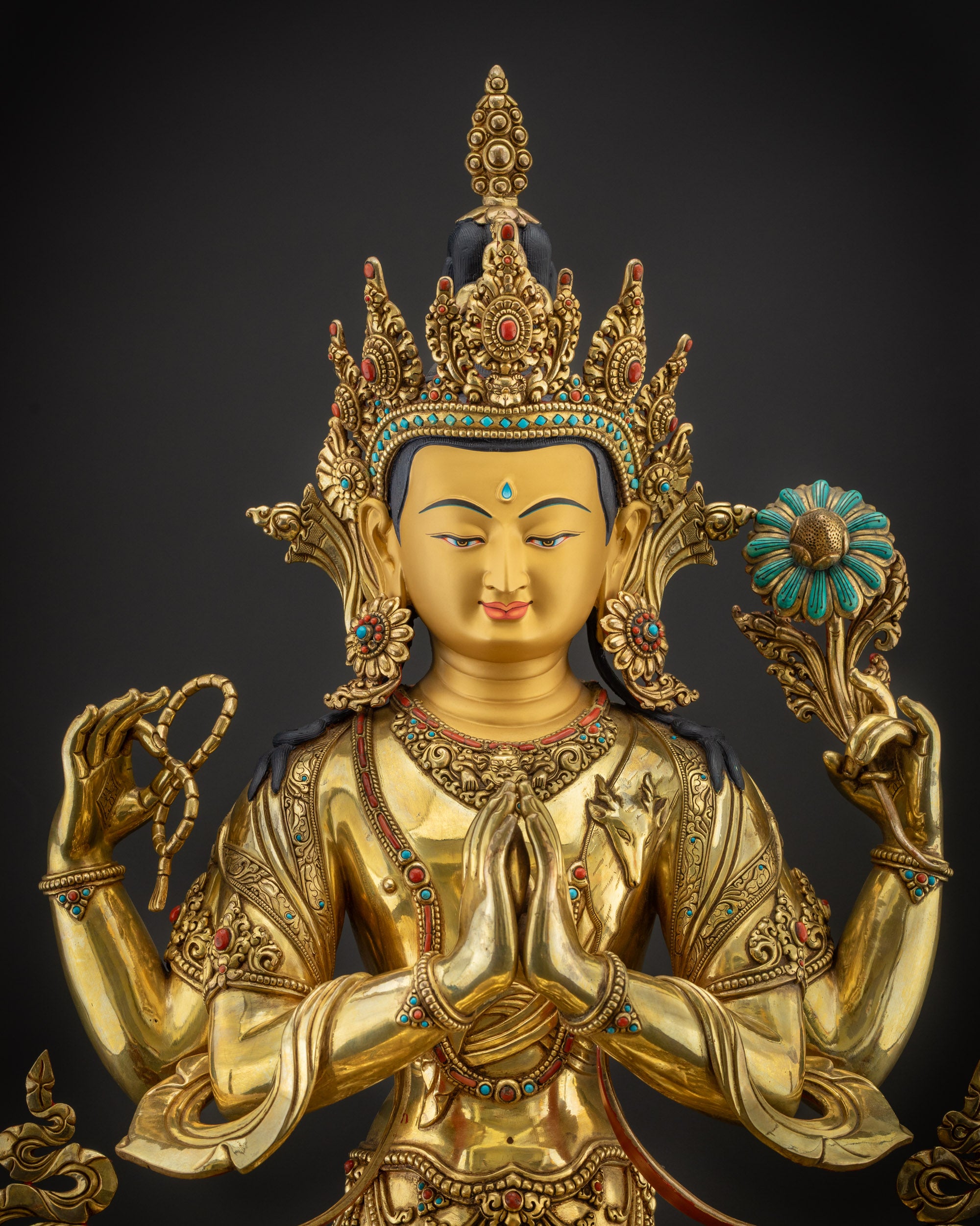 Regular close up of Chenrezig hand holding crystal rosary spiritual symbol
