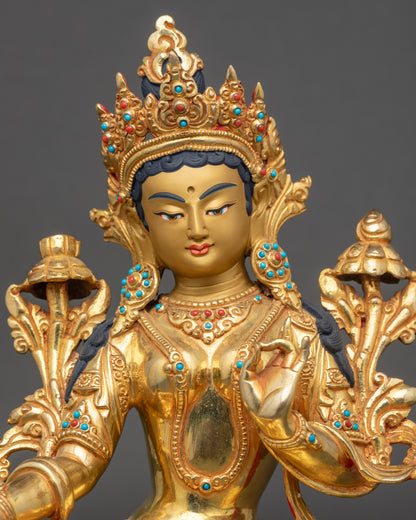 Regular close up of Green Tara Statue showing gold fire-gilded copper details