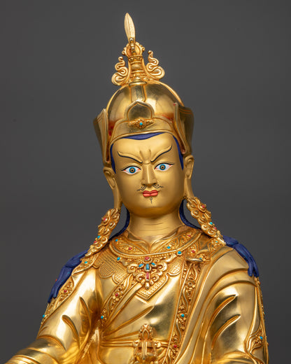 Regular close up of Guru Rinpoche statue showing wrathful yet compassionate face

