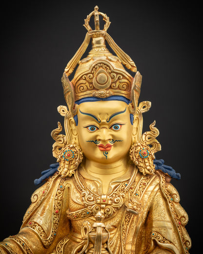 Regular close up of Guru Rinpoche statue with semi-precious stone details