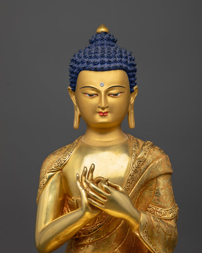 Regular close up of Vairocana Buddha statue showing gold fire-gilded base and robes