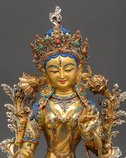 Regular close up of White Tara meditation sculpture with jeweled crown and utpala flower