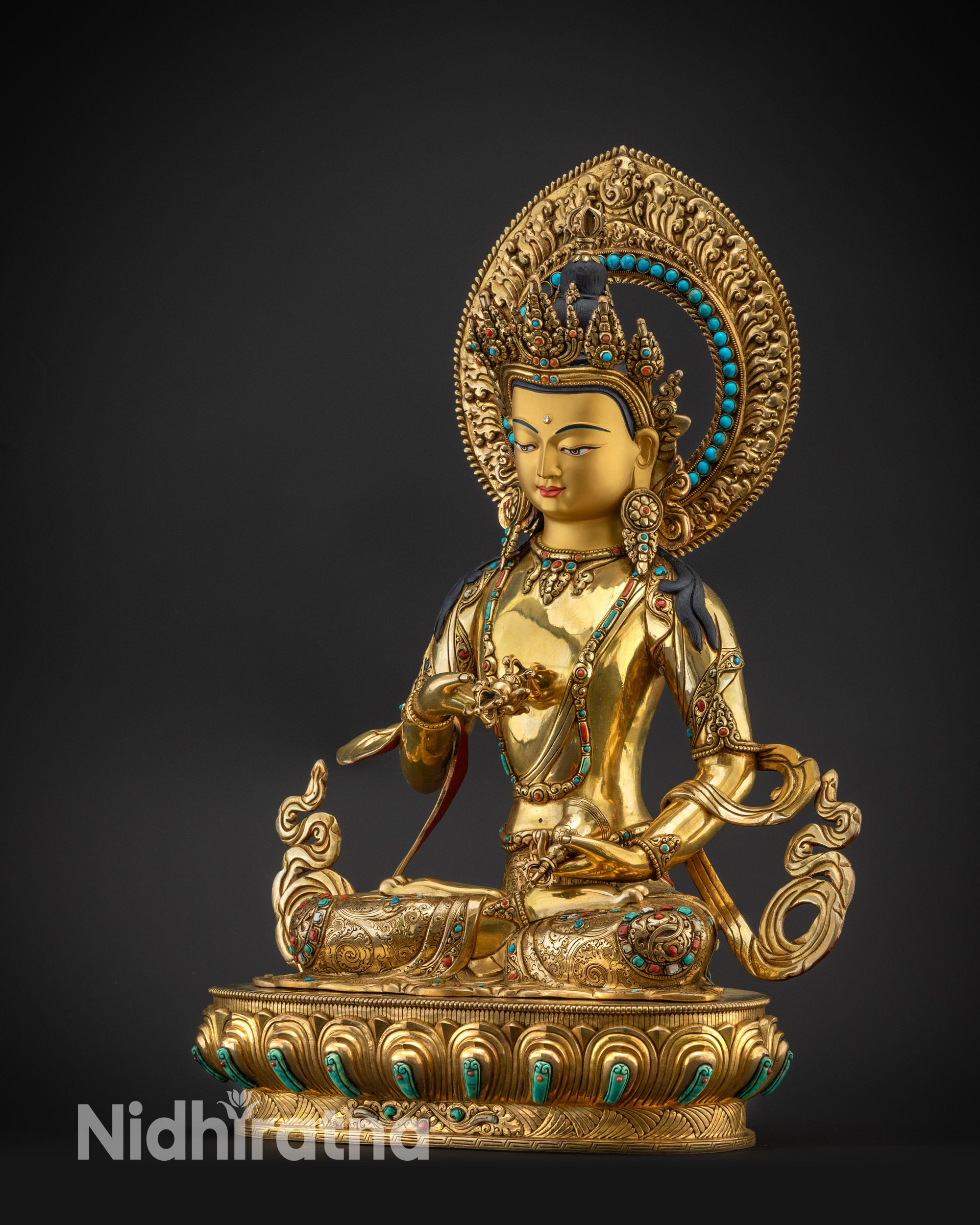 Regular left side view Vajrasattva statue showing flowing robe and jeweled ornaments