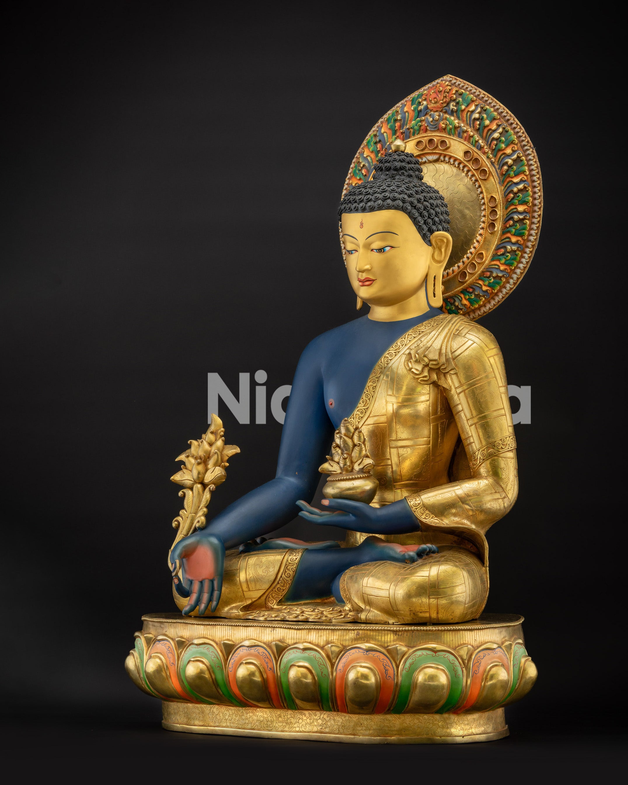 Regular left side view of 44" Medicine Buddha Statue with lapis-lazuli colored surface