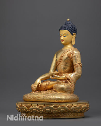Regular left side view of Shakyamuni Buddha statue showing flowing robe patterns
