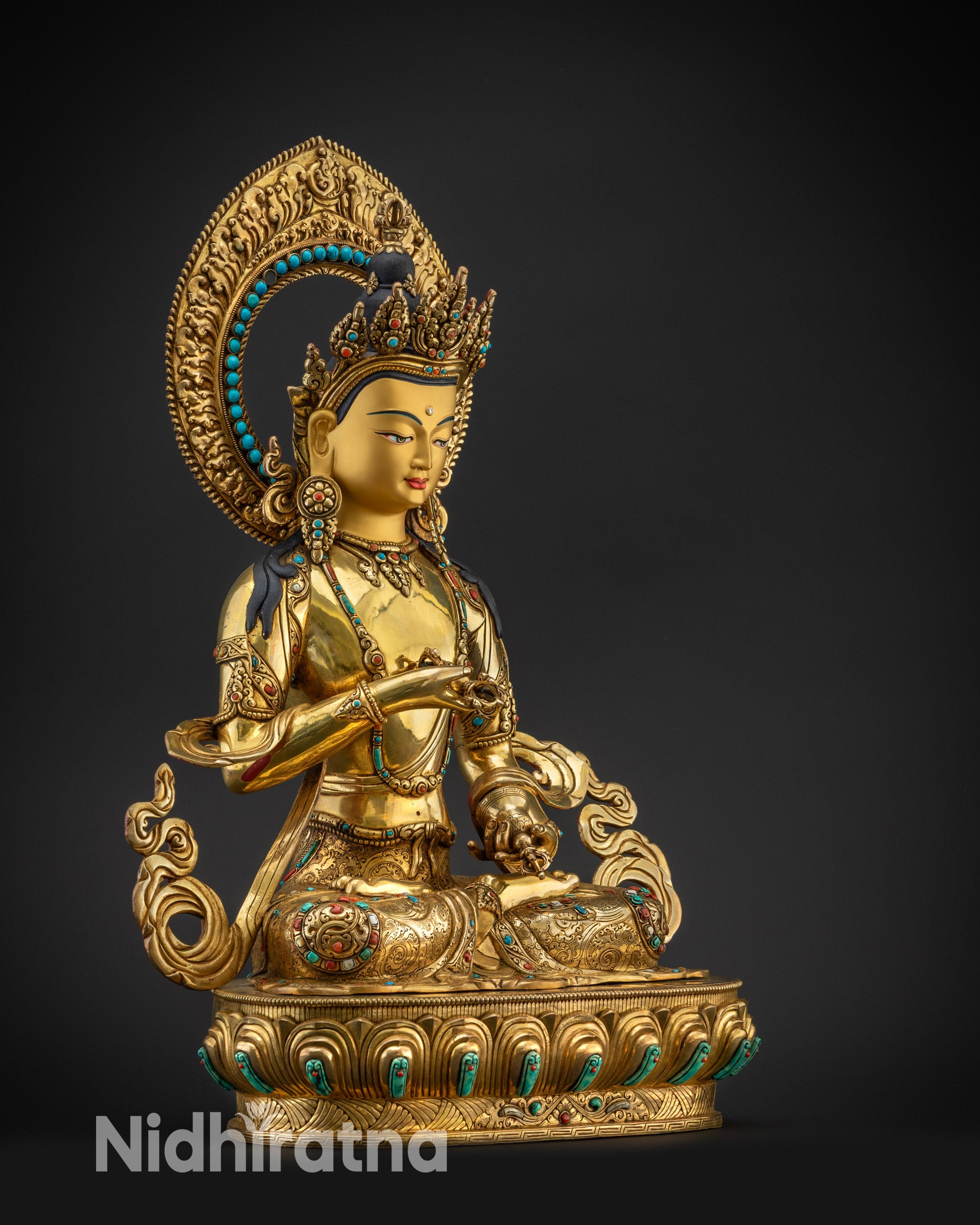 Regular right side view Vajrasattva statue seated on lotus base with halo