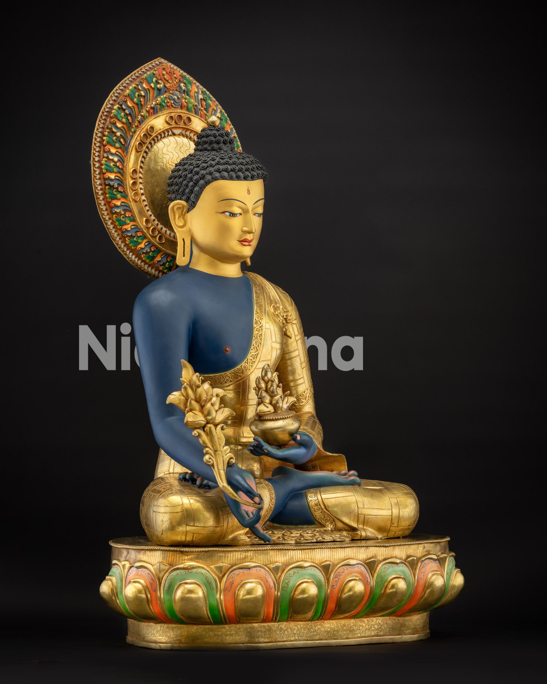 Regular right side view of Nepalese Medicine Buddha Sculpture with gold-gilded features
