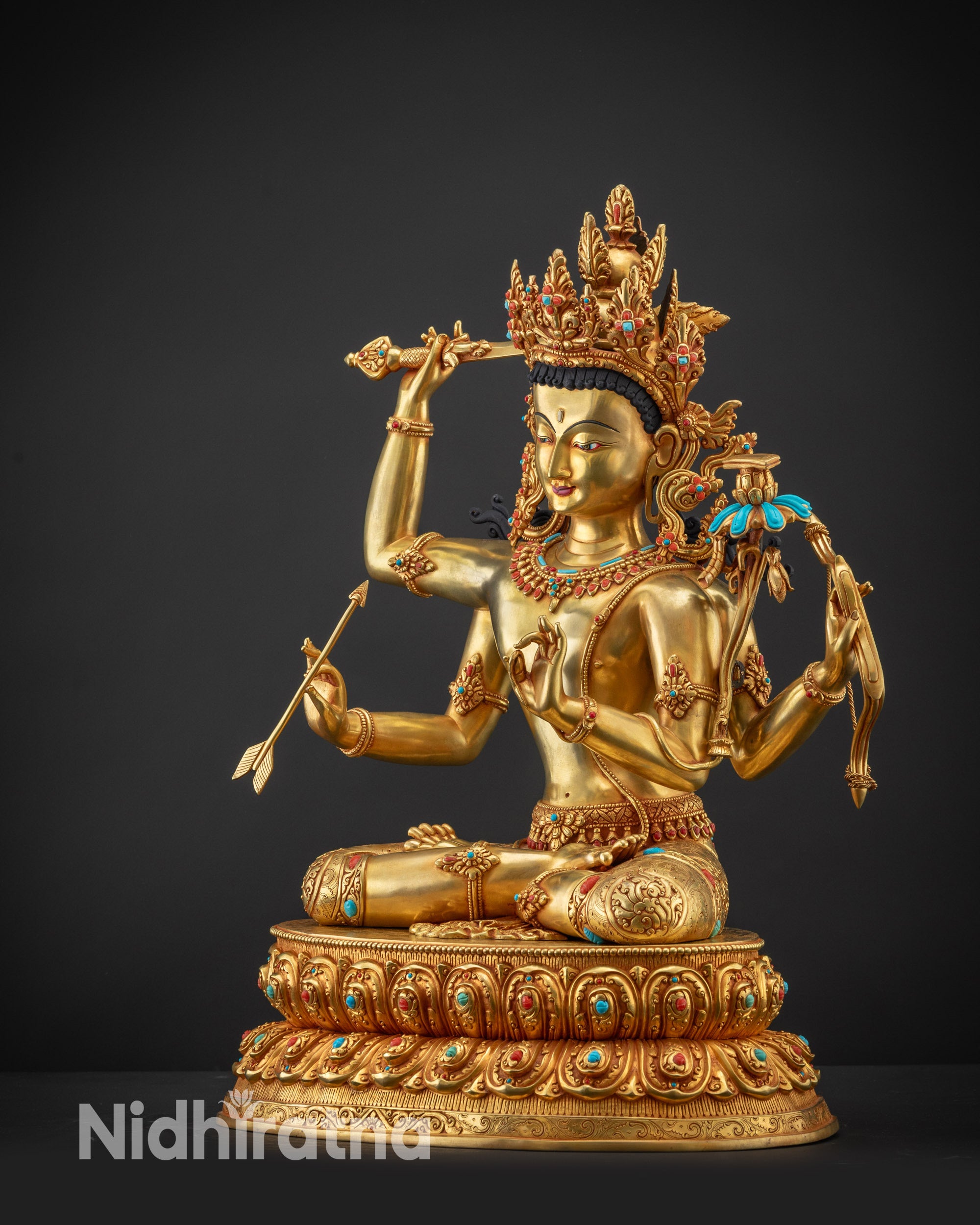 Regular side left Maha Manjushri Statue fire gilded robe on copper base with luminous gold texture
