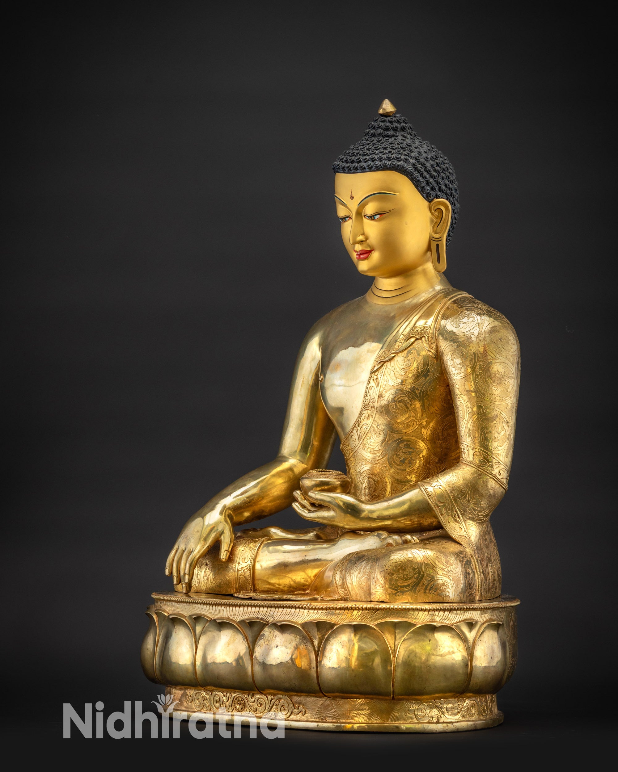 Regular side left view Buddha Shakyamuni statue with carved monk’s robe and lotus base
