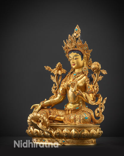 Regular side left view of Green Tara statue highlighting gold fire-gilded body
