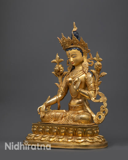 Regular side left view of White Tara Statue showing hand mudras and robe
