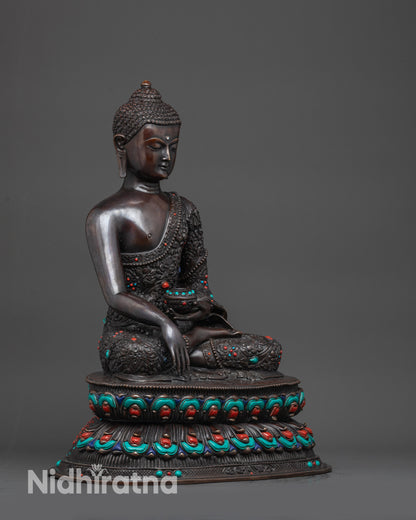 Regular side right Buddha Shakyamuni oxidized statue showing flowing monk robe details
