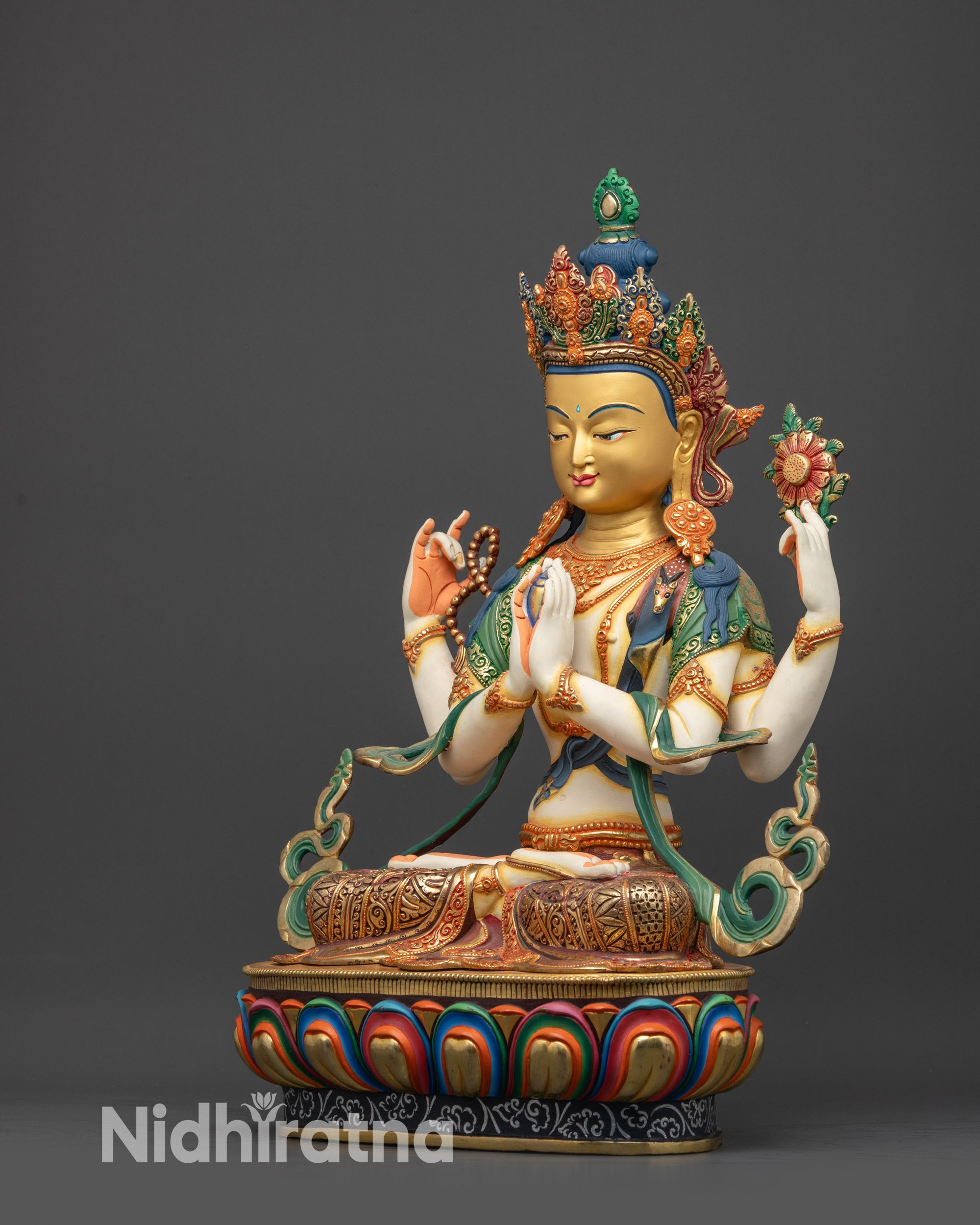 Regular side view of White-Hued Chenrezig Bodhisattva sculpture on lotus seat
