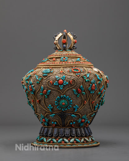 Tibetan copper rice bowl front view with gold plating and gemstones for Buddhist rituals

