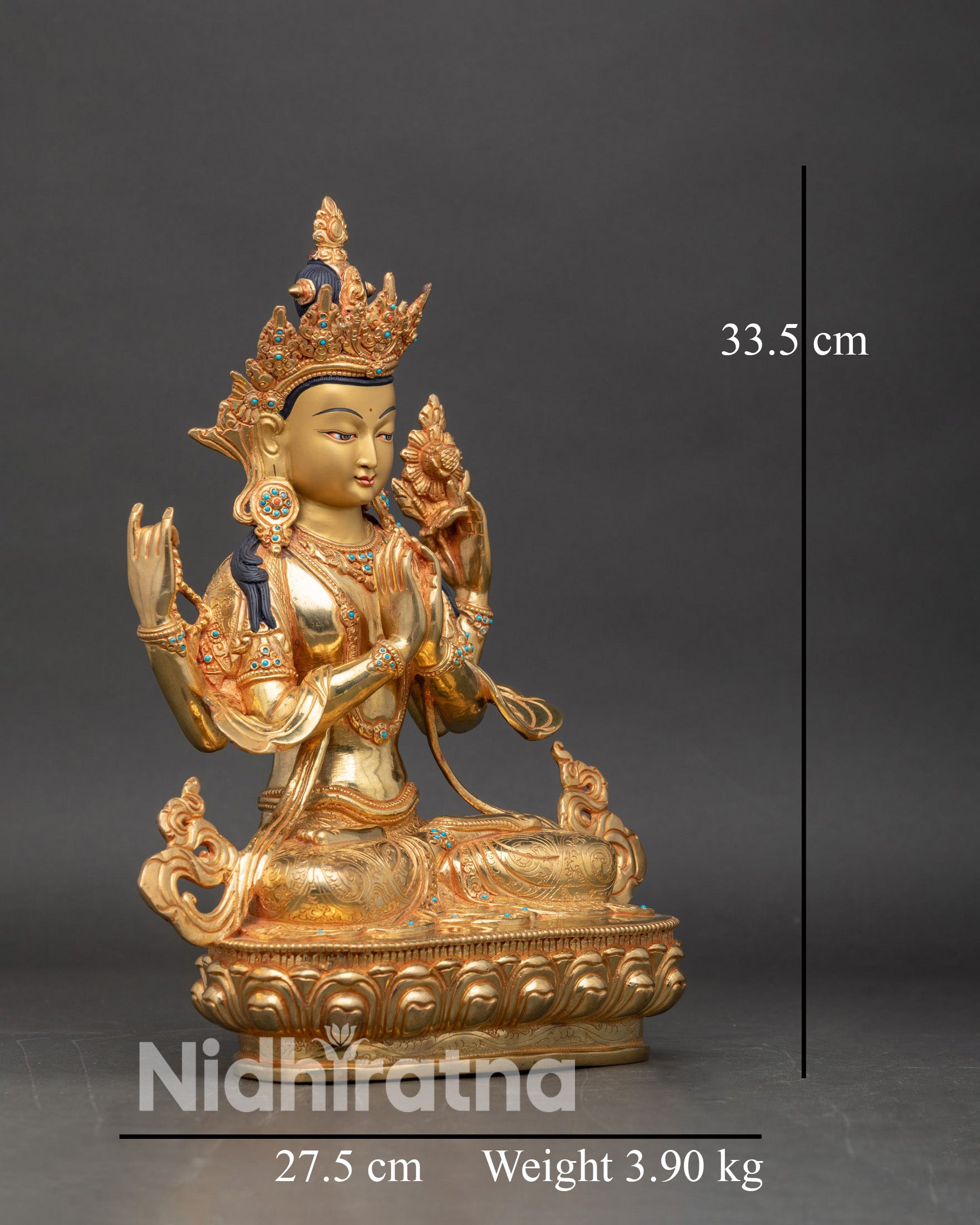 Right profile of Four Armed Chenrezig statue holding lotus and mala Nepalese Buddhist art