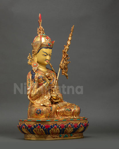 Right-angle view of Tsokye Dorje Statue displaying vajra, kapala, and trident details
