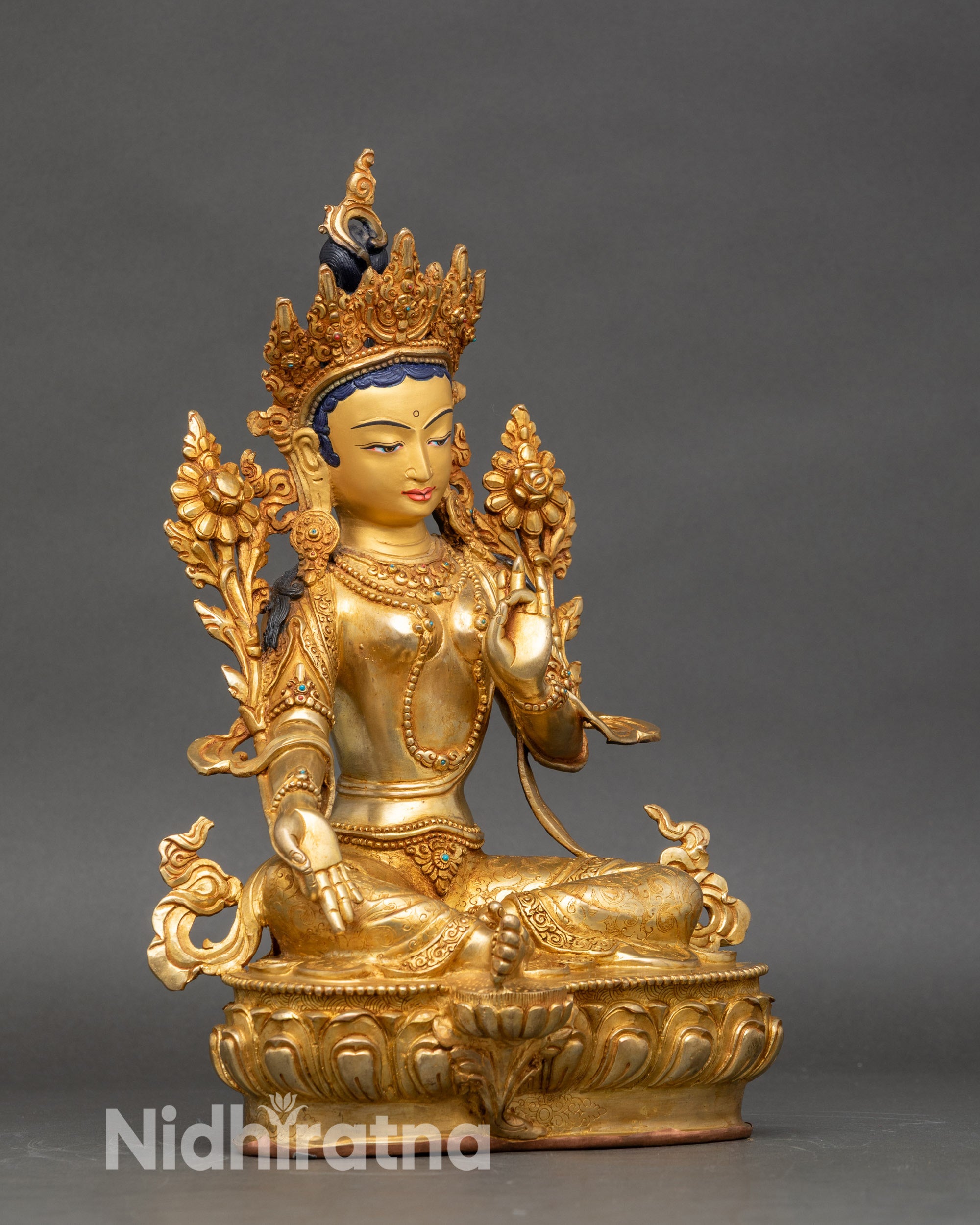 Right profile of Green Tara statue on lotus throne, handcrafted copper and gold finish