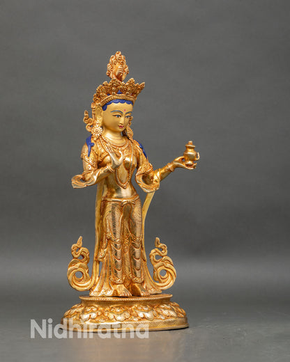 Right profile of Yeshe Tsogyal statue, standing dakini with kapala and blessing mudra