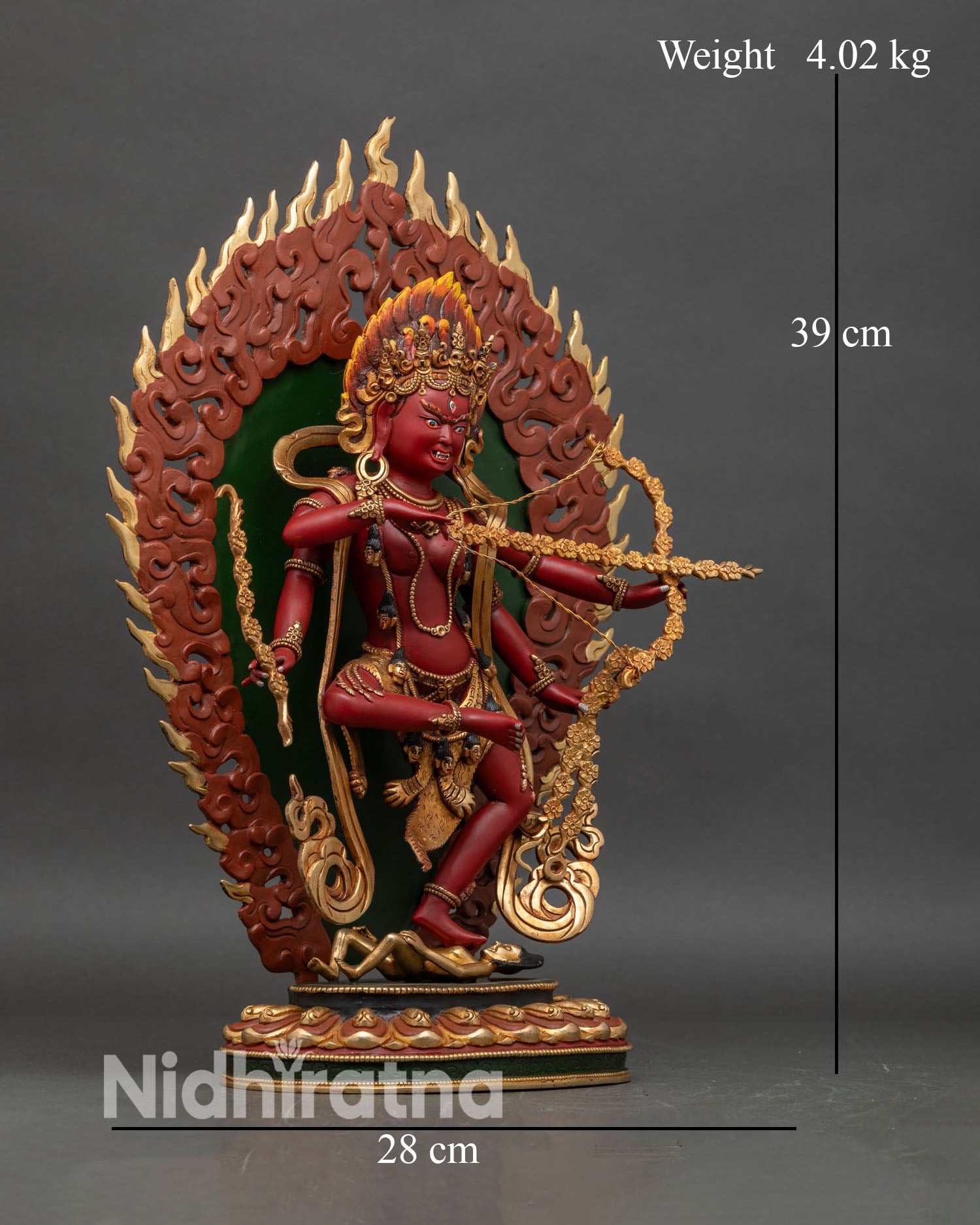 Right-side view of Kurukulla statue, adorned with tiger-skin garment and ornate jewelry