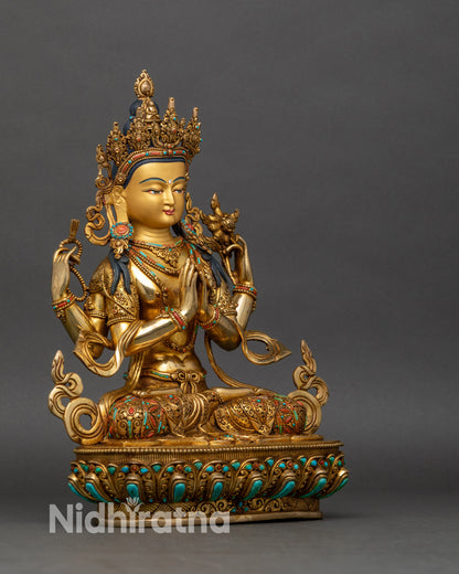 Right side view of 4-Armed Chenrezig statue, lotus pedestal and prayer hands visible