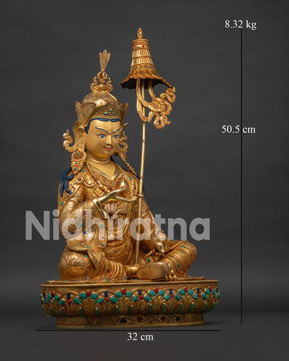 Right side view of Guru Norlha statue featuring sacred parasol, 24K gold fire-gilded, Patan Nepal