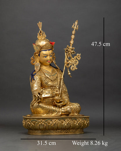 Right side view of Guru Rinpoche statue, copper craftsmanship with sacred attributes