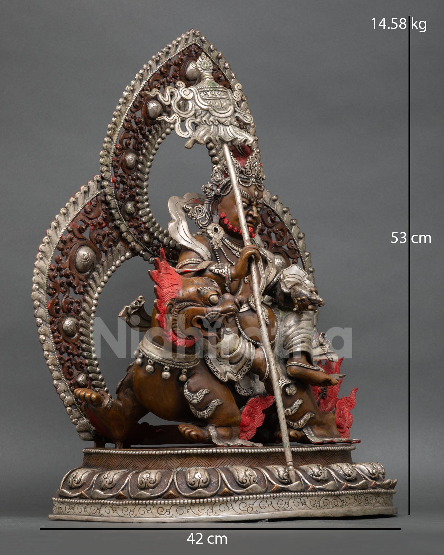 Right side view of Namtoshe statue riding snow lion with victory banner and sacred wealth symbols