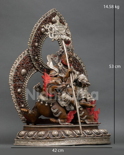 Right side view of Namtoshe statue riding snow lion with victory banner and sacred wealth symbols
