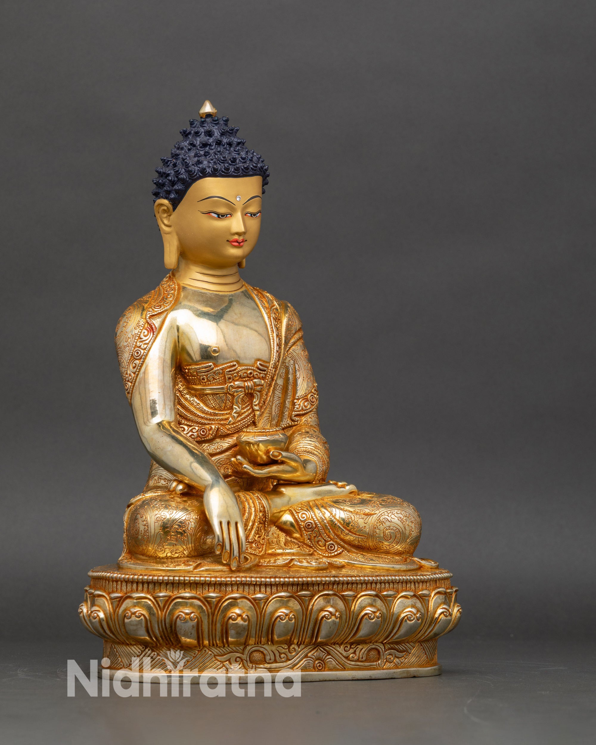 Right-side view of Shakyamuni Buddha copper statue with gold fire-gilded details
