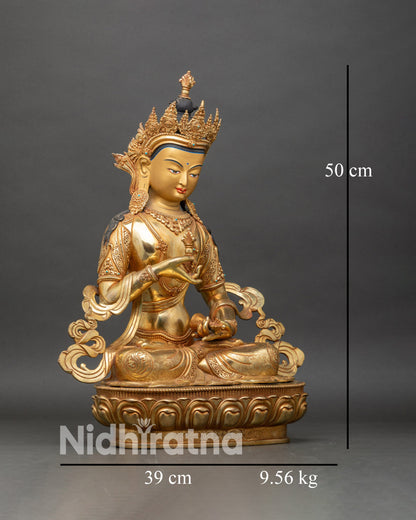 Right side view of Vajrasattva Buddhist statue holding vajra and bell on lotus seat