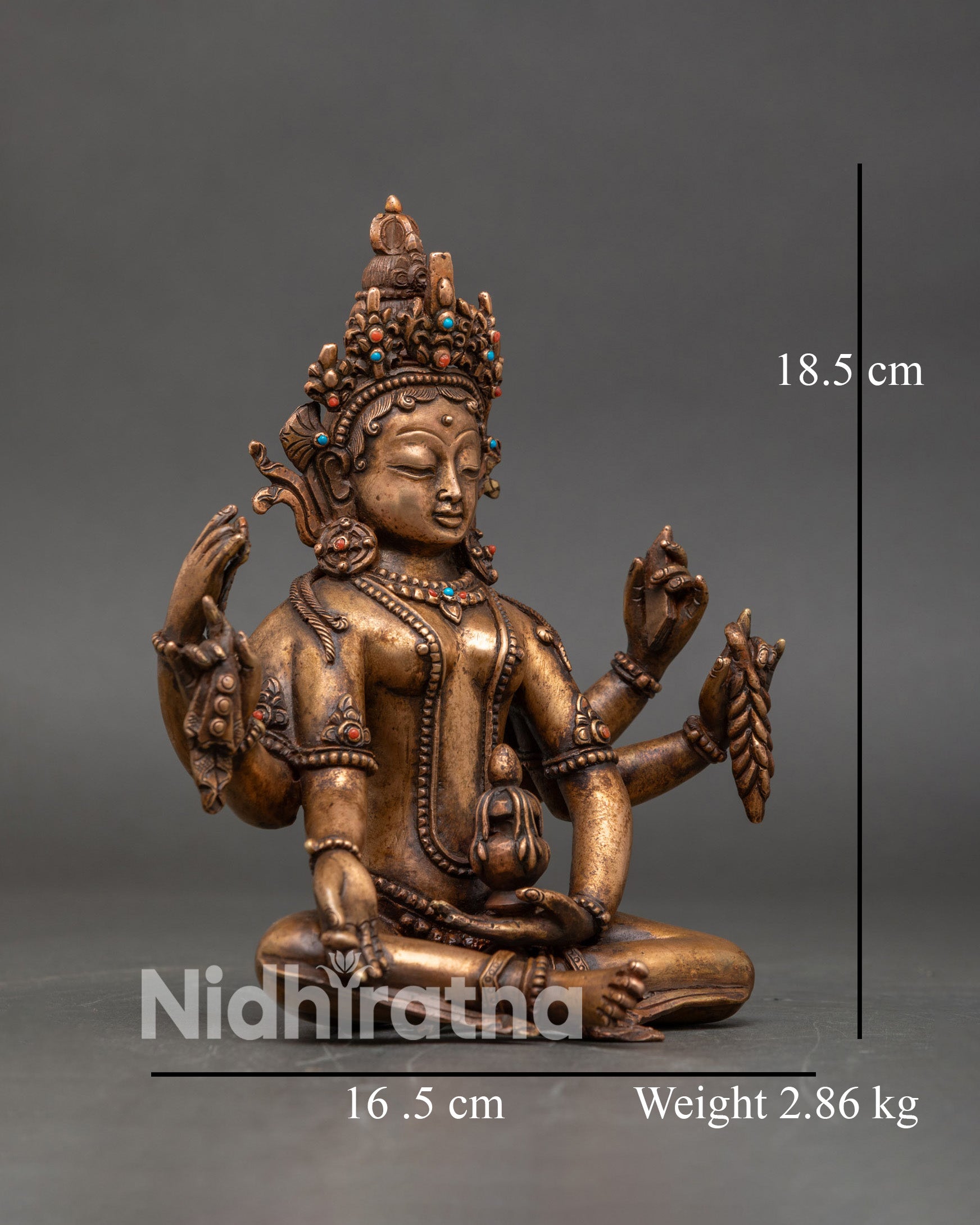 Right side view of Vasudhara statue, copper and bronze Buddhist sculpture