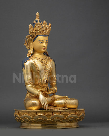 Right-side view of Buddha Mitrugpa copper statue seated on lotus pedestal with detailed robes
