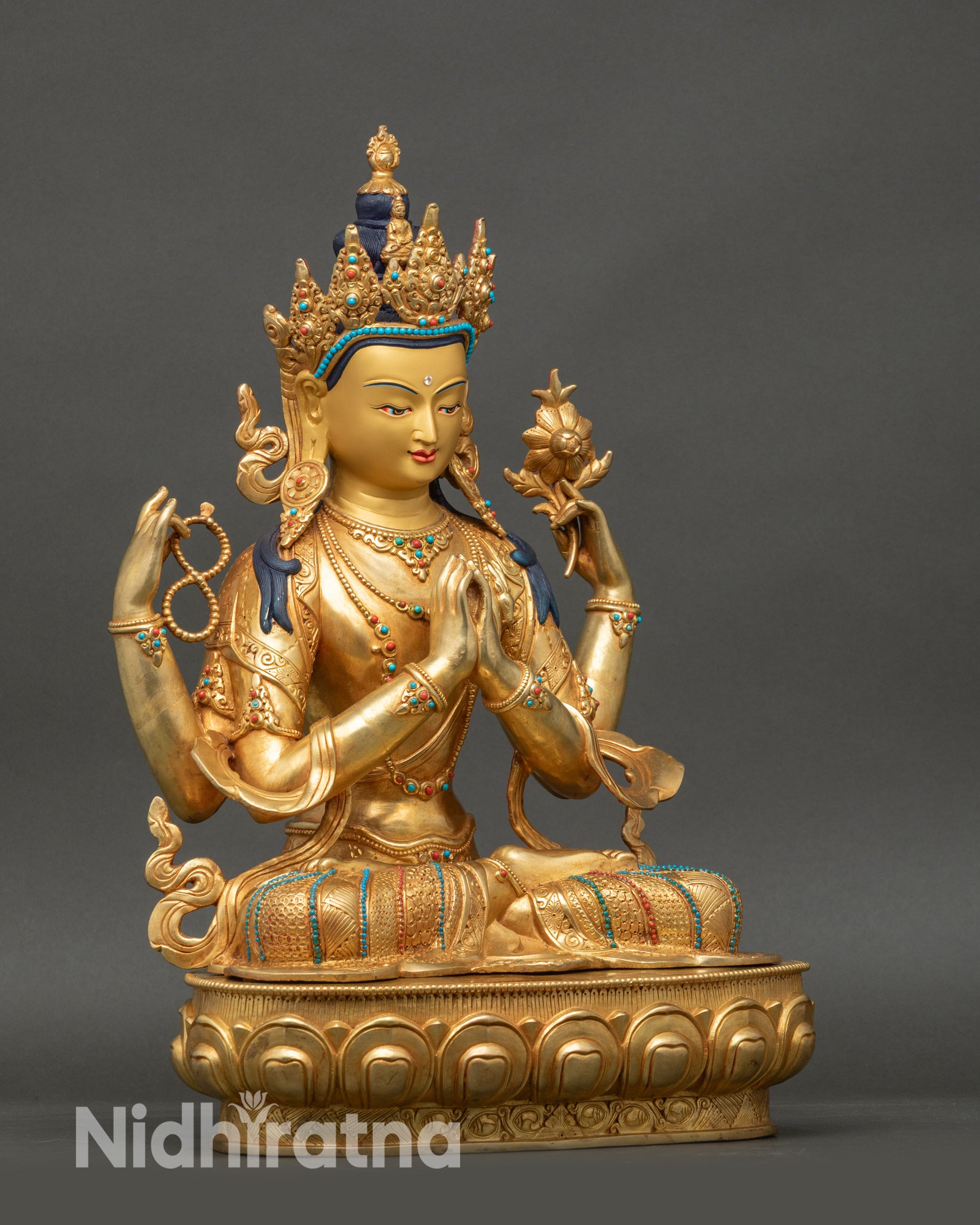 Right-side view of Chenrezig statue on lotus throne with gold fire-gilded finish