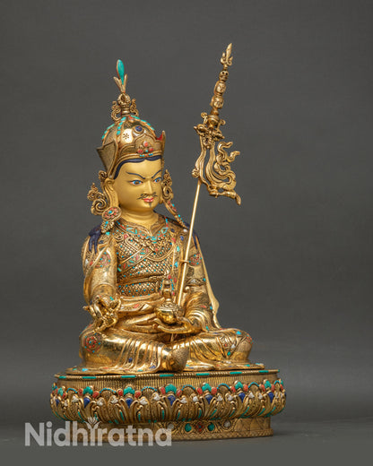 Right profile of Padmasambhava statue, copper craftsmanship, gold fire-gilding, and semi-precious stone embellishments
