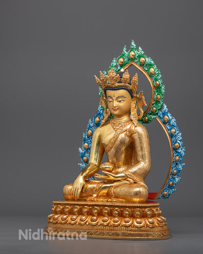 Right angle of Buddha sculpture with crown, halo, and vivid acrylic details