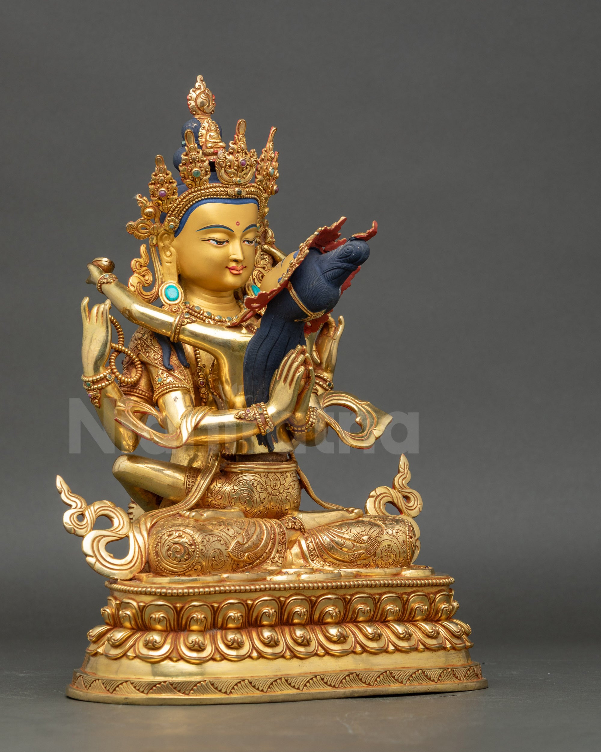 Right angle of Nepalese lost-wax copper Buddha and consort statue