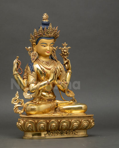 Right angle view of Four-Armed Chenrezig Statue with lotus and ornaments