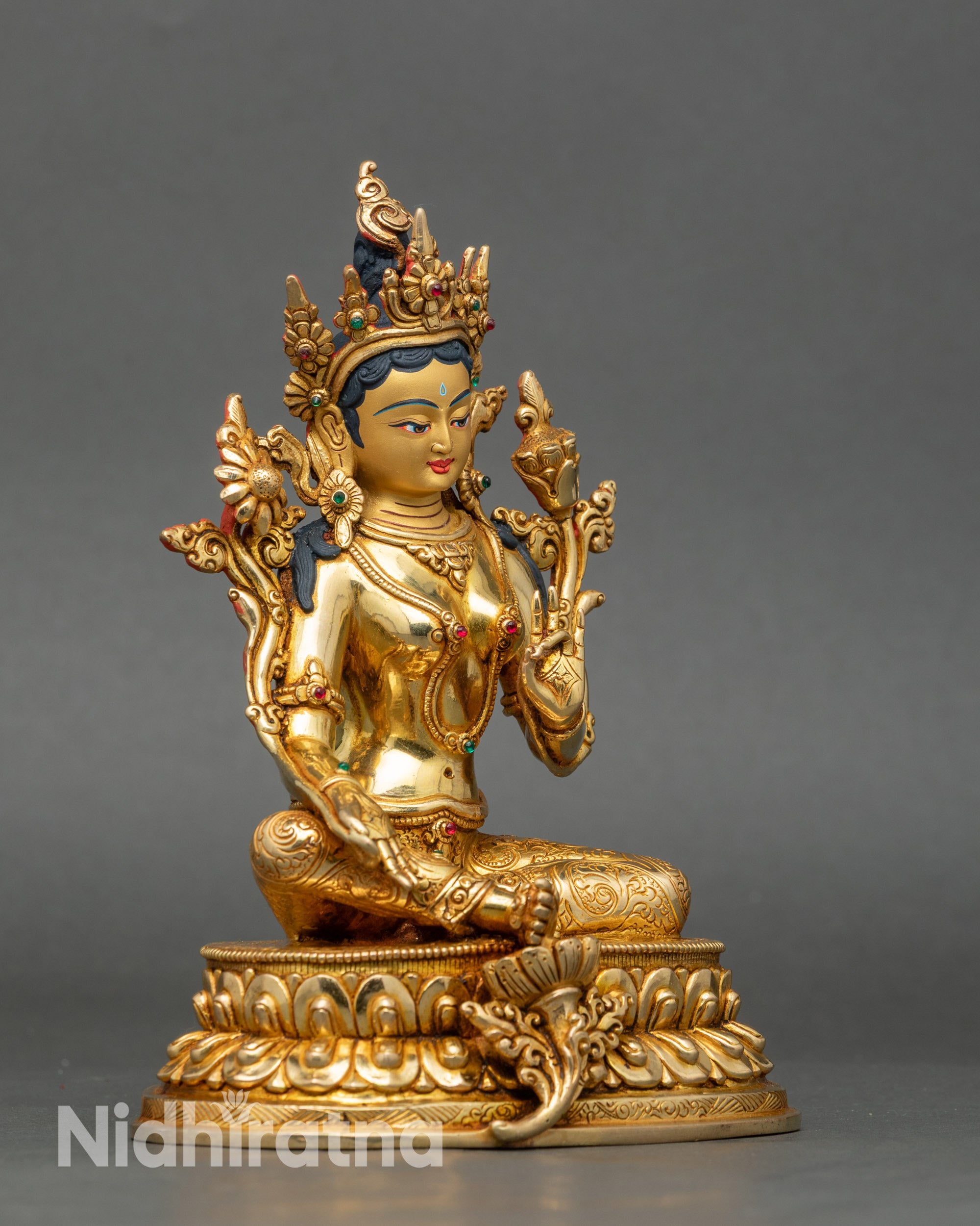 Right profile of Green Tara statue, fire-gilded copper, Nepalese spiritual sculpture