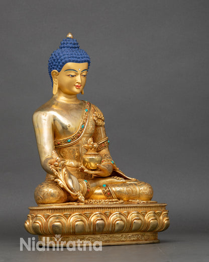 Right profile of Medicine Buddha statue, handcrafted Nepalese copper and gold sculpture