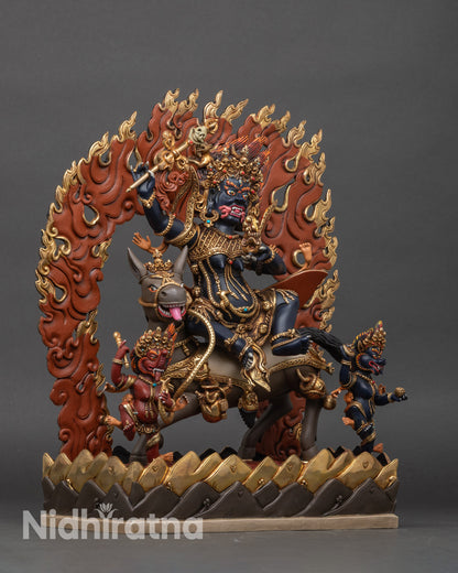 Right profile of Palden Lhamo, seated on mule, halo and miniature deity detailed.