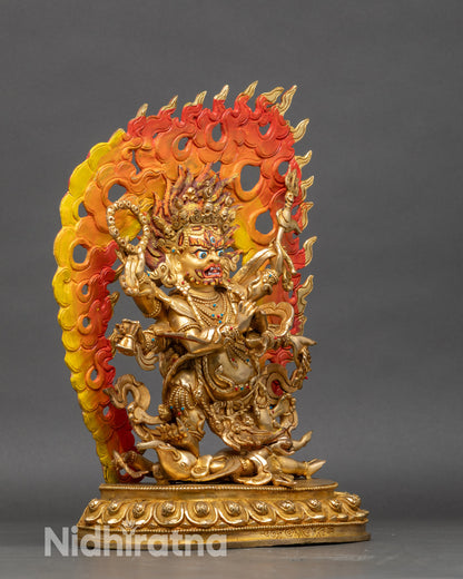 Right profile of Six-Armed Mahakala statue on lotus throne with flame halo