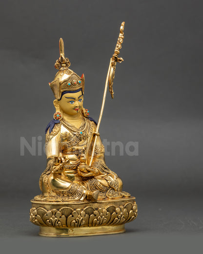 Right side Guru Rinpoche Vajrayana statue with Tripitaka robe and floral carvings