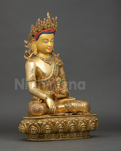 Right side of Mitrugpa Buddha statue displaying lotus seat, Vajra, and intricate robe carvings.