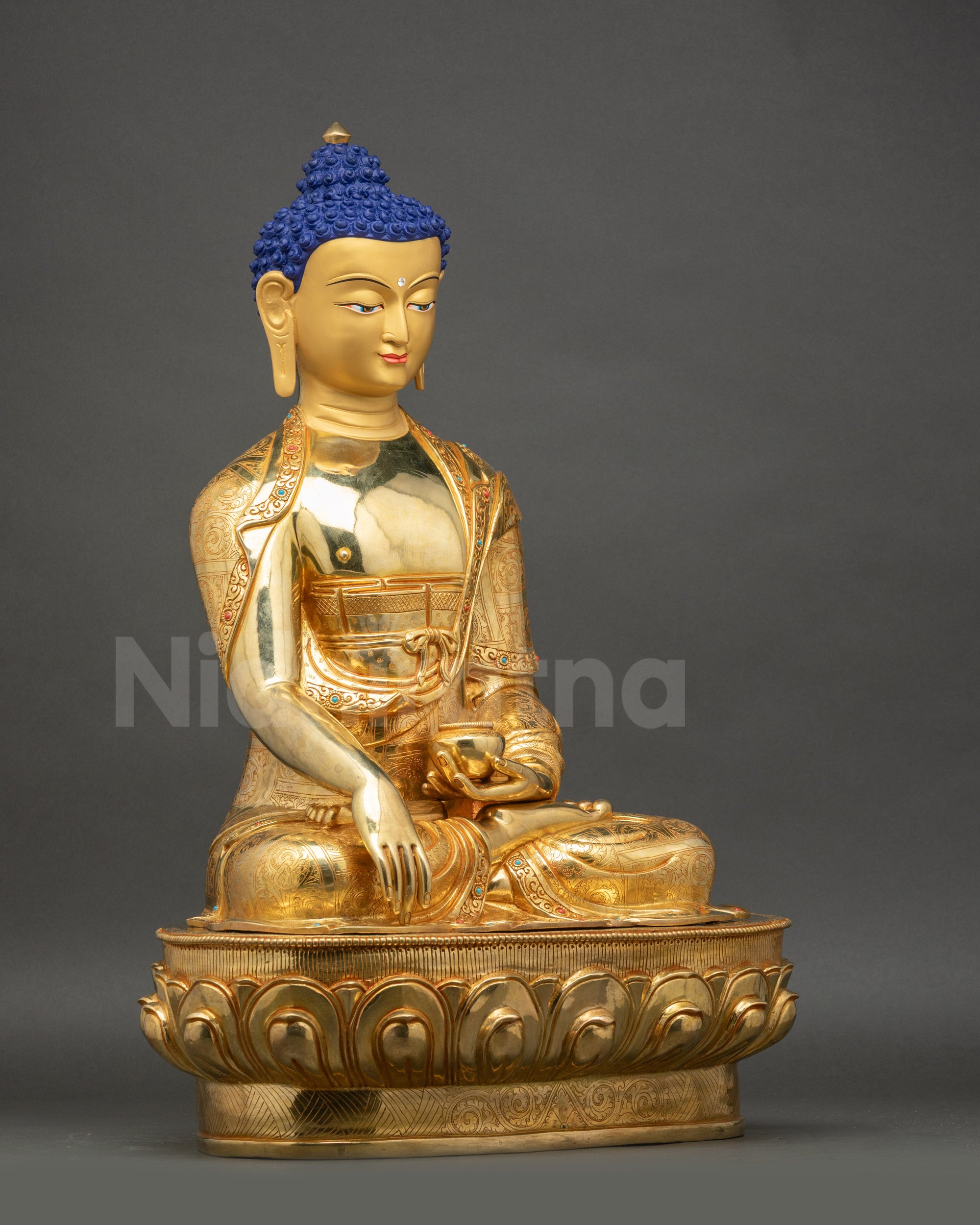 Right side of Shakyamuni Buddha Statue emphasizing lotus posture and intricate copper carvings