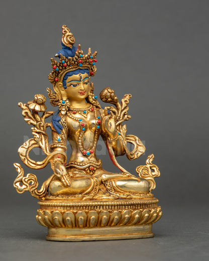 Right side of White Tara Statue seated on double-lotus pedestal, Varada and Vitarka mudra