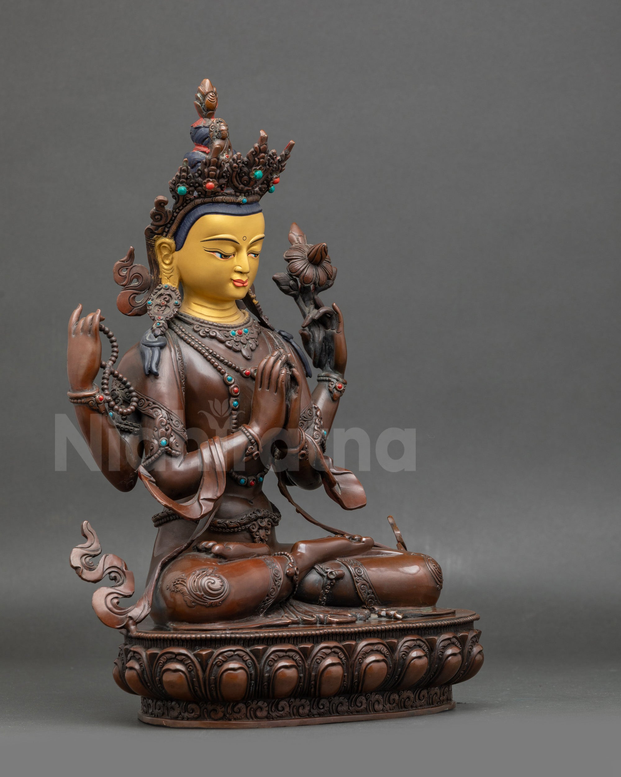 Right side view – Handmade Chenrezig statue showing crystal mala and lotus symbolism